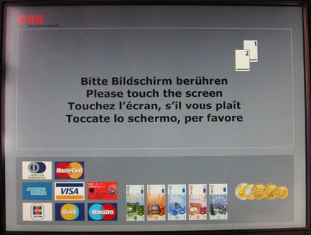 ÖBB-Fahrkartenautomat: Startbildschirm mit Aufforderung zum Drücken