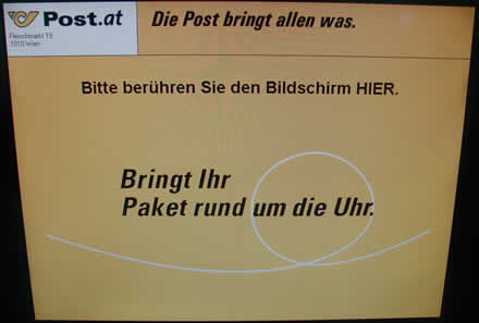 Startbildschirm: "Bitte berühren Sie den Bildschirm HIER."